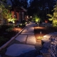 landscape lighting fixtures along a path